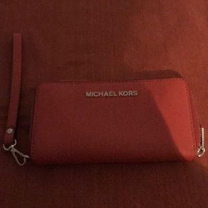 Michael Kors Bags - Michael Kors Orange wristlet wallet Michael Kors Bags - Michael Kors Orange wristlet wallet